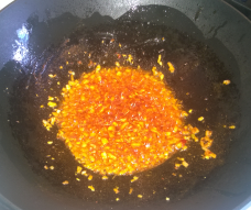 Shallots, garlic, paprika powder, trassi and sambal frying
