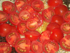 Choped shallots, garlic and tomatos.