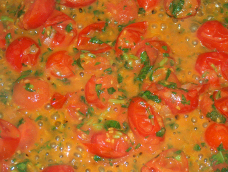 Choped shallots, garlic, tomatos and basil.