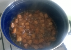 The satay meat frying in the pan